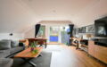 Whg-Kücknitz-Wohnzimmer-Balkon